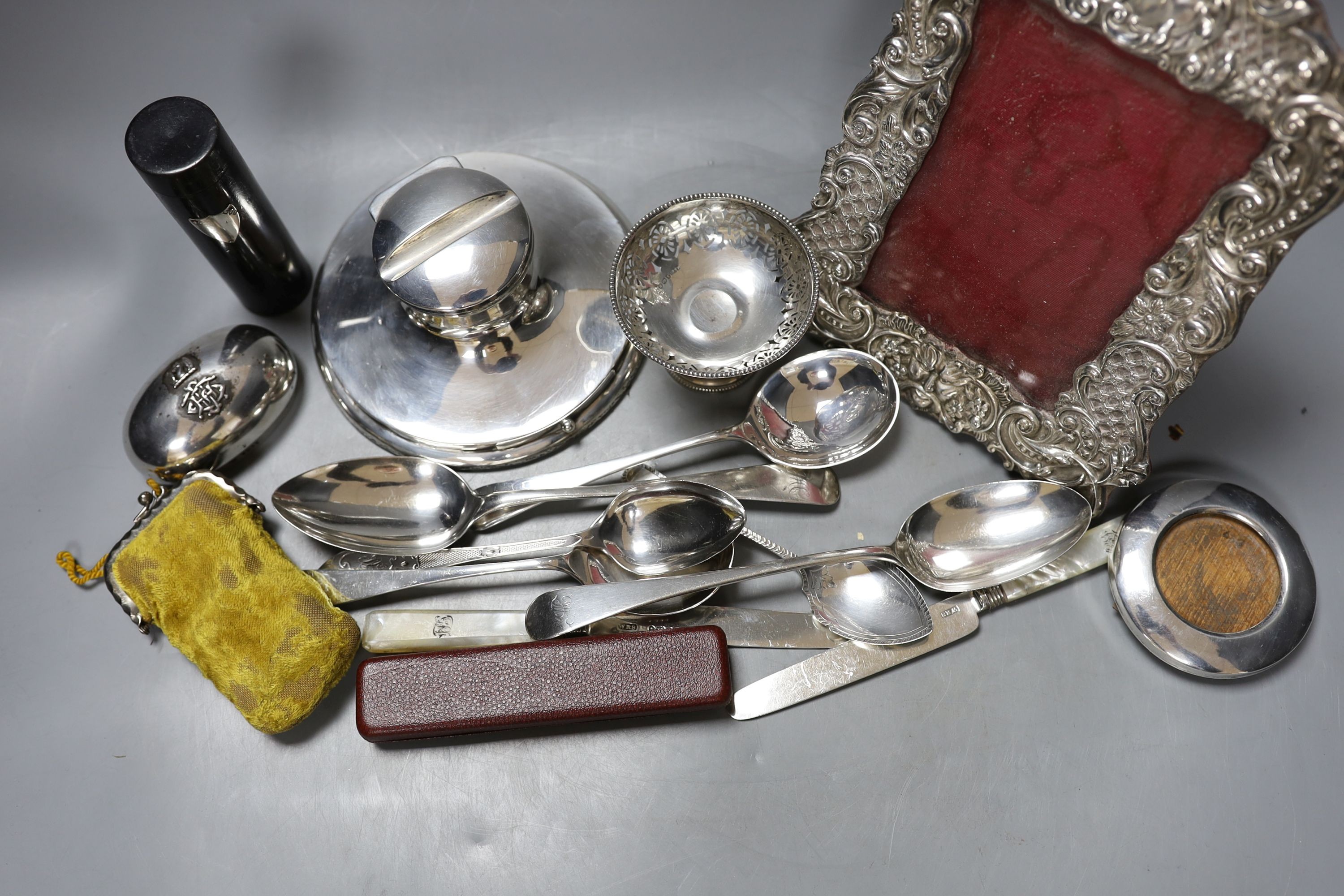 Assorted small silver including a photograph frame, flatware, inkwell and small pedestal dish, etc.